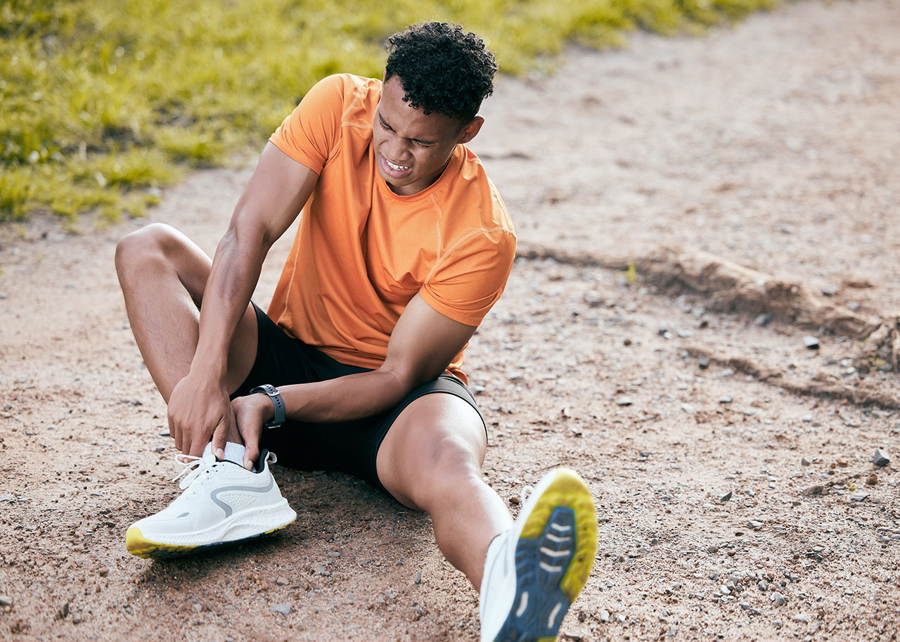 man with injured ankle